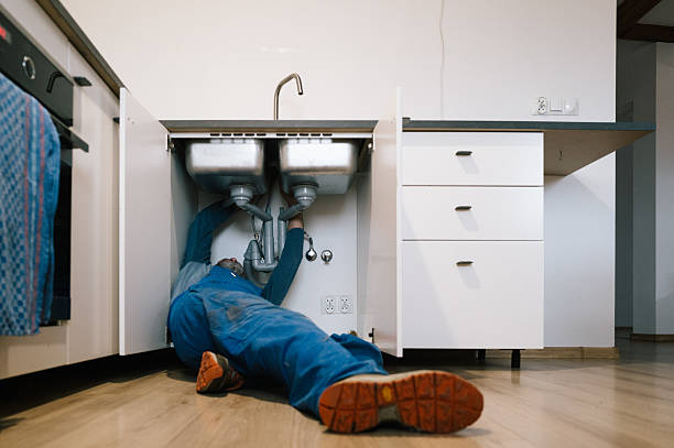 Professional Emergency Plumber technician working in Colver, PA